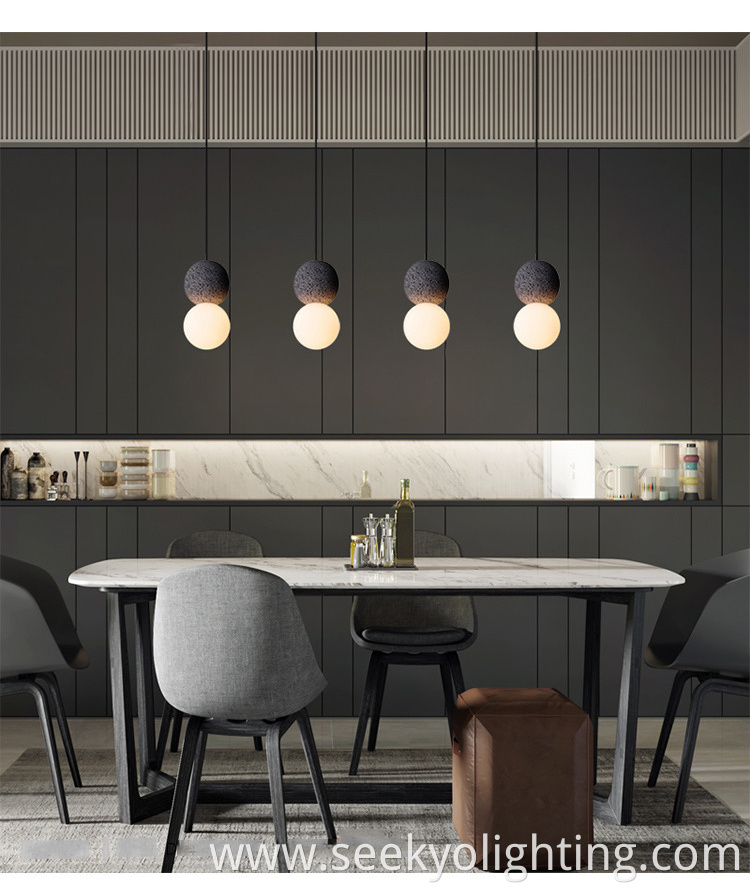 The pendant lamp chandelier is suspended from the ceiling and provides ample lighting for the dining area. The pendant lamp chandelier is suspended from the ceiling and provides ample lighting for the dining area.